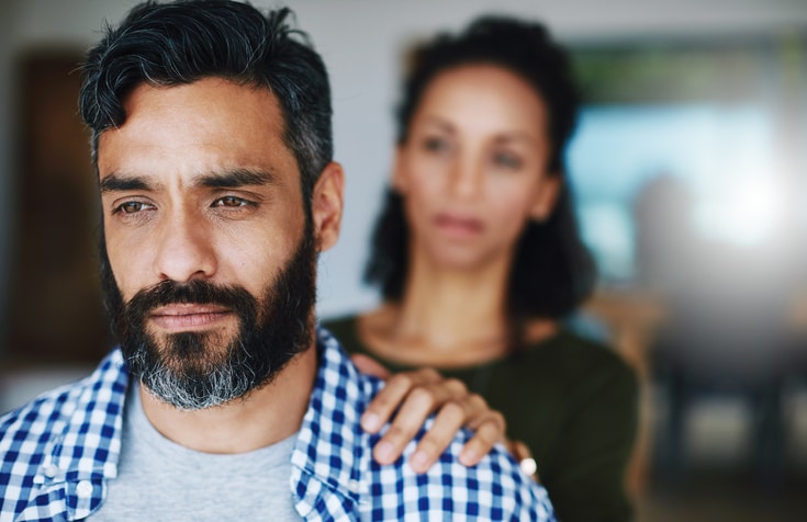 wife talking to her husband with depression