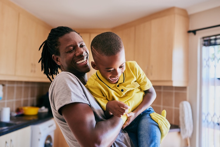 man raising his son with a health self esteem