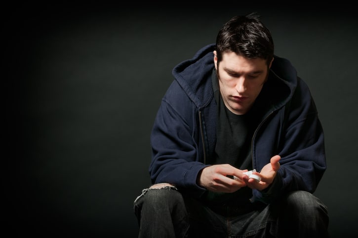 man struggling with suicidal thoughts