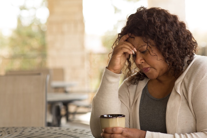 woman suffering from uncommon signs of depression