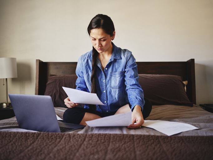woman trying to figure out insurance