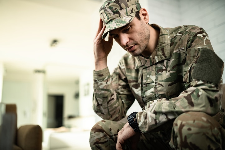young military member feeling depressed